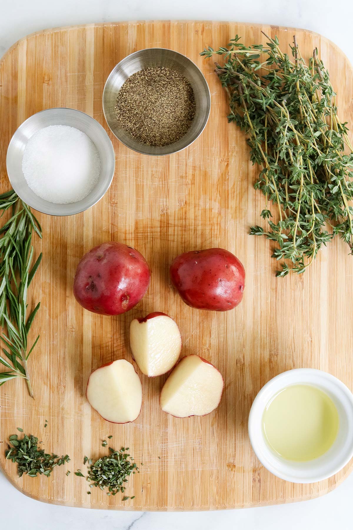 Ingredients to make roasted rosemary potatoes.