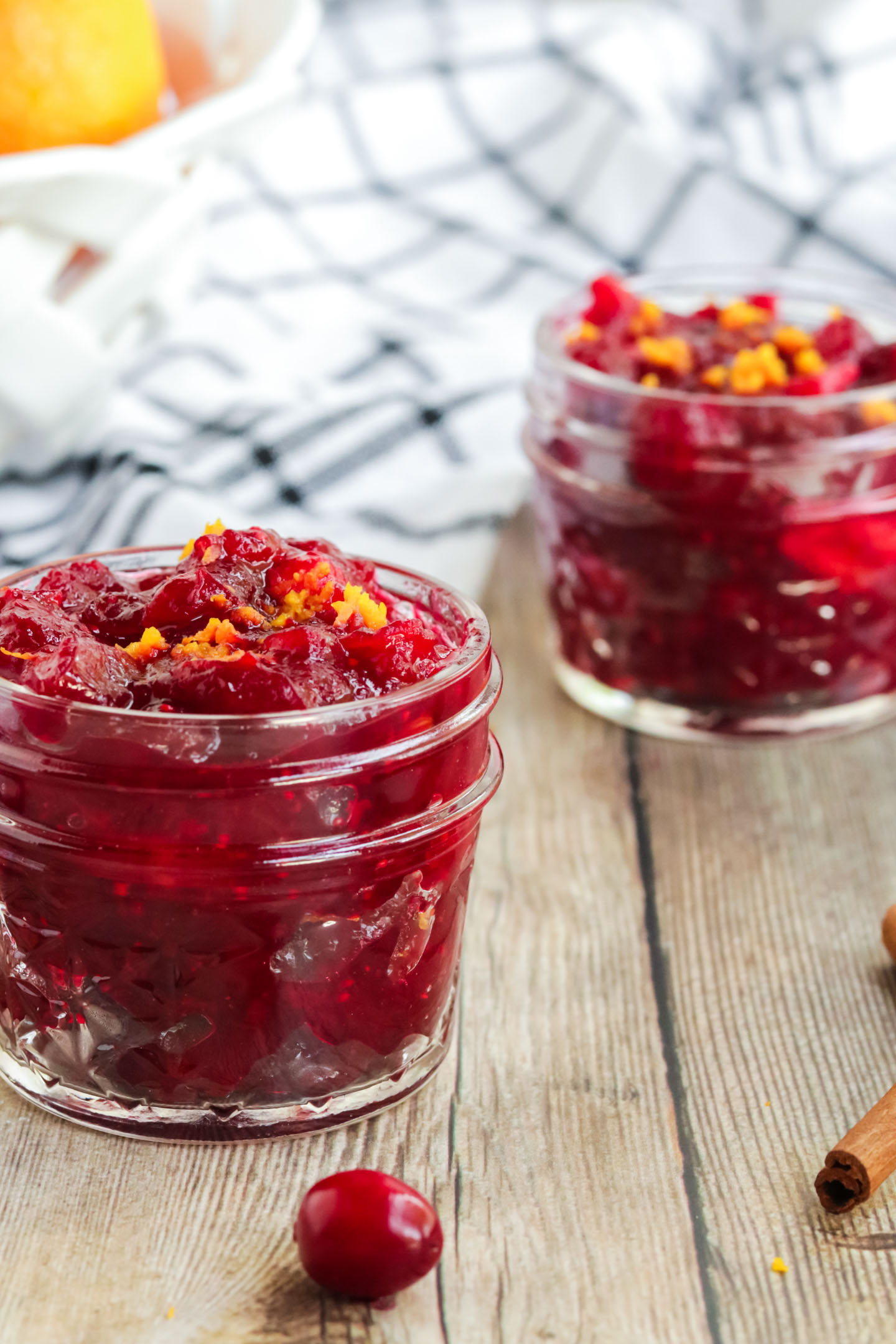 Cranberry Orange Sauce, Cranberry Sauce in a little glass jar with orange zest on top