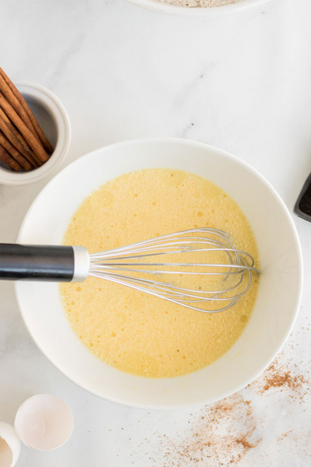 Ready to add the flour mixture to the wet ingredients for eggnog waffles