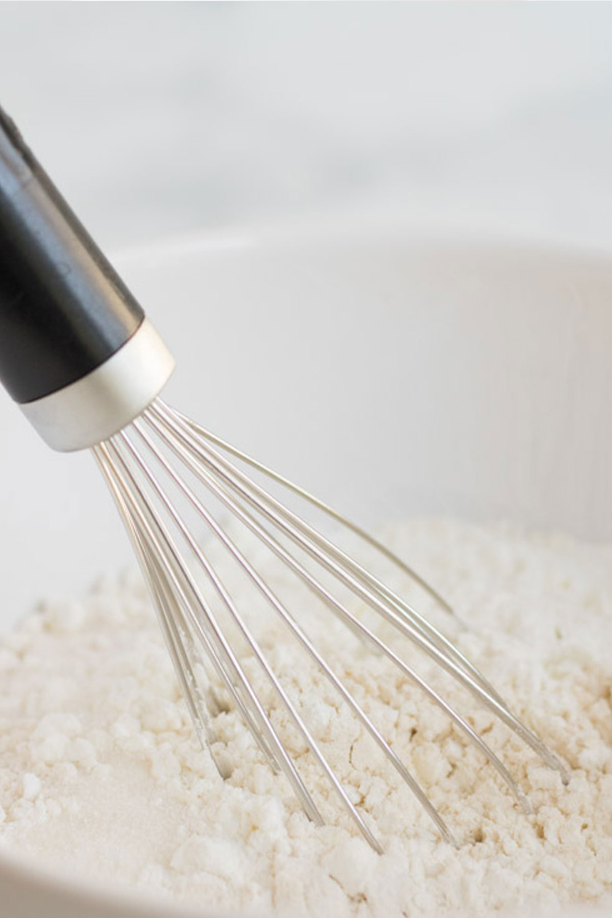 Whisking the dry ingredients in a bowl