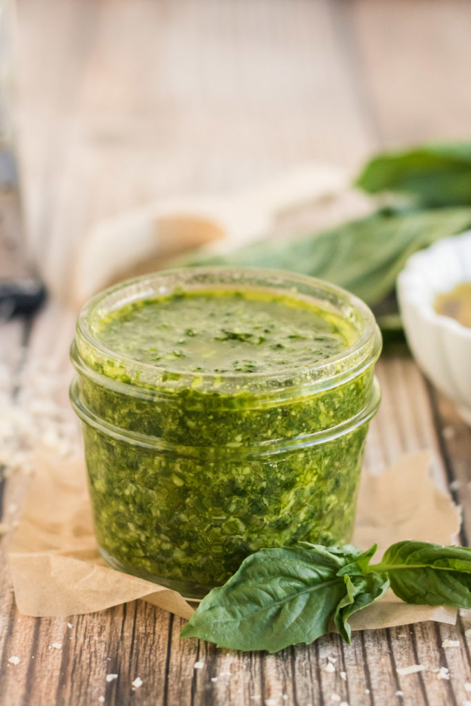 A small jar of fresh nut free basil pesto sauce