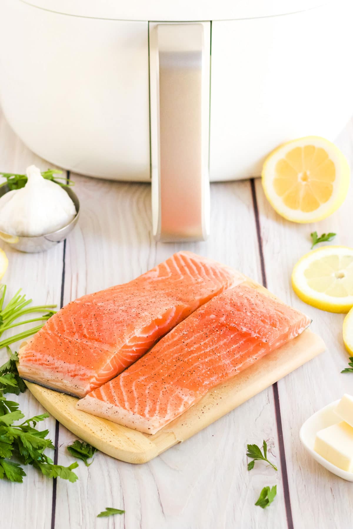 Ingredients to make air fryer salmon on the table.