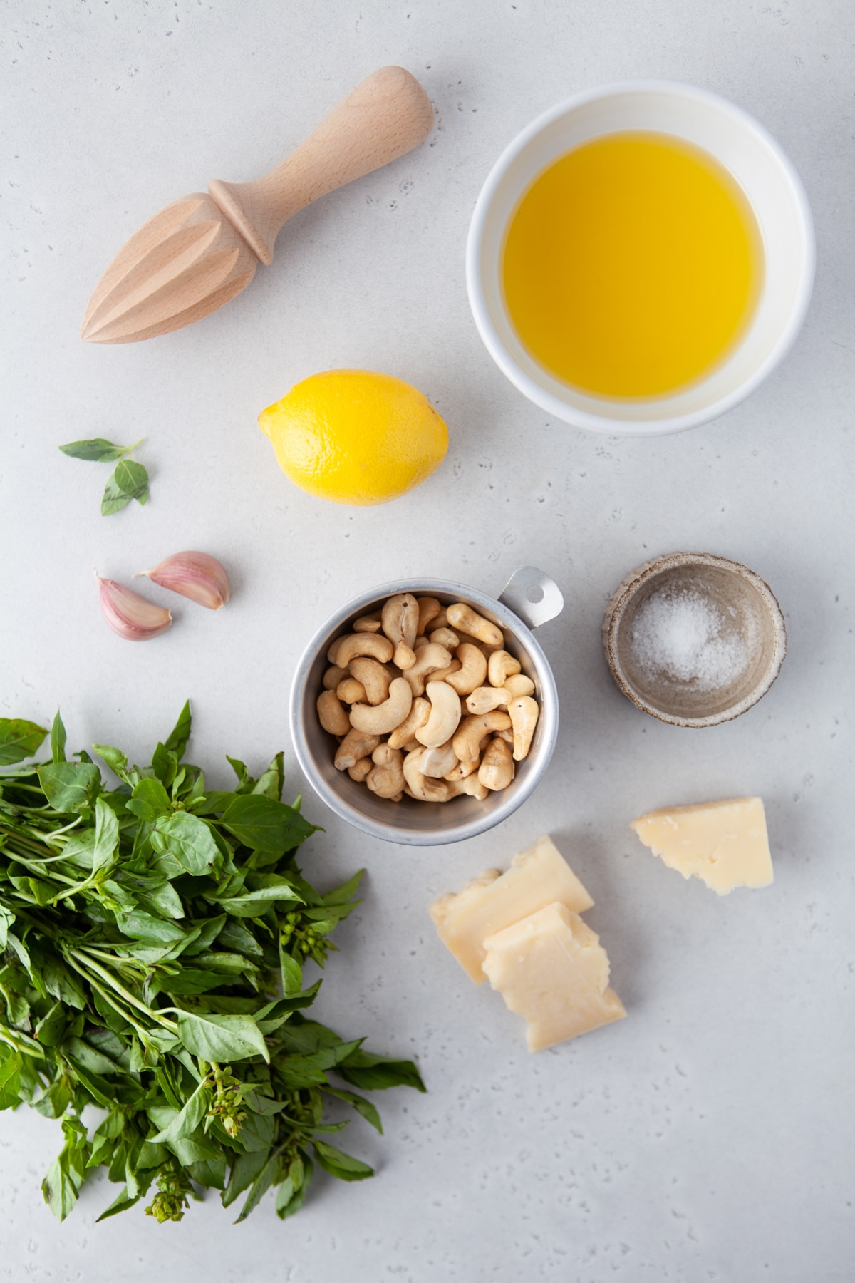 Image of ingredients needed to make cashew pesto sauce. 