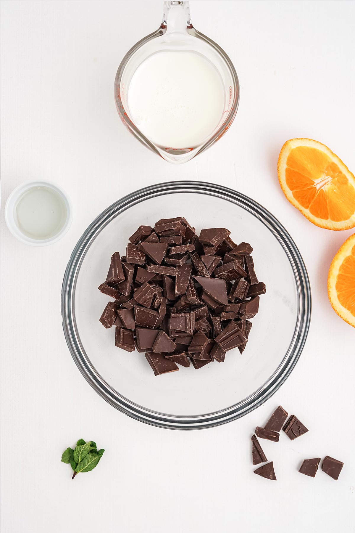 Ingredients to make chocolate ganache for chocolate and orange cake.