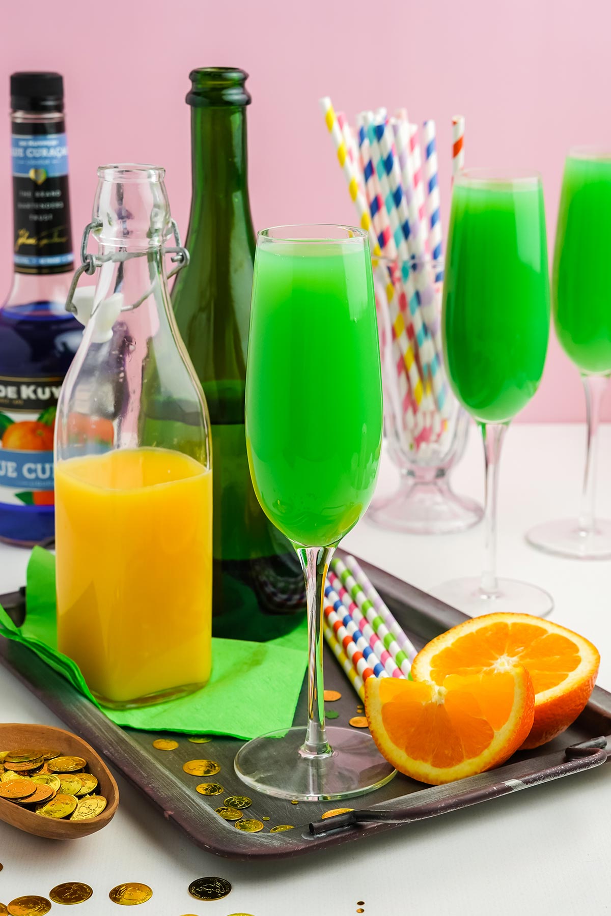 St. Patrick's Day celebration table with green mimosas on it.