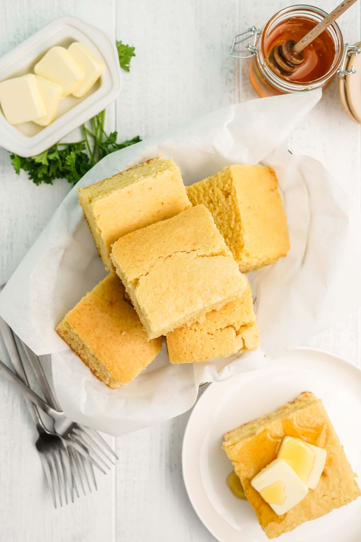 Basket of cornbread on the table.