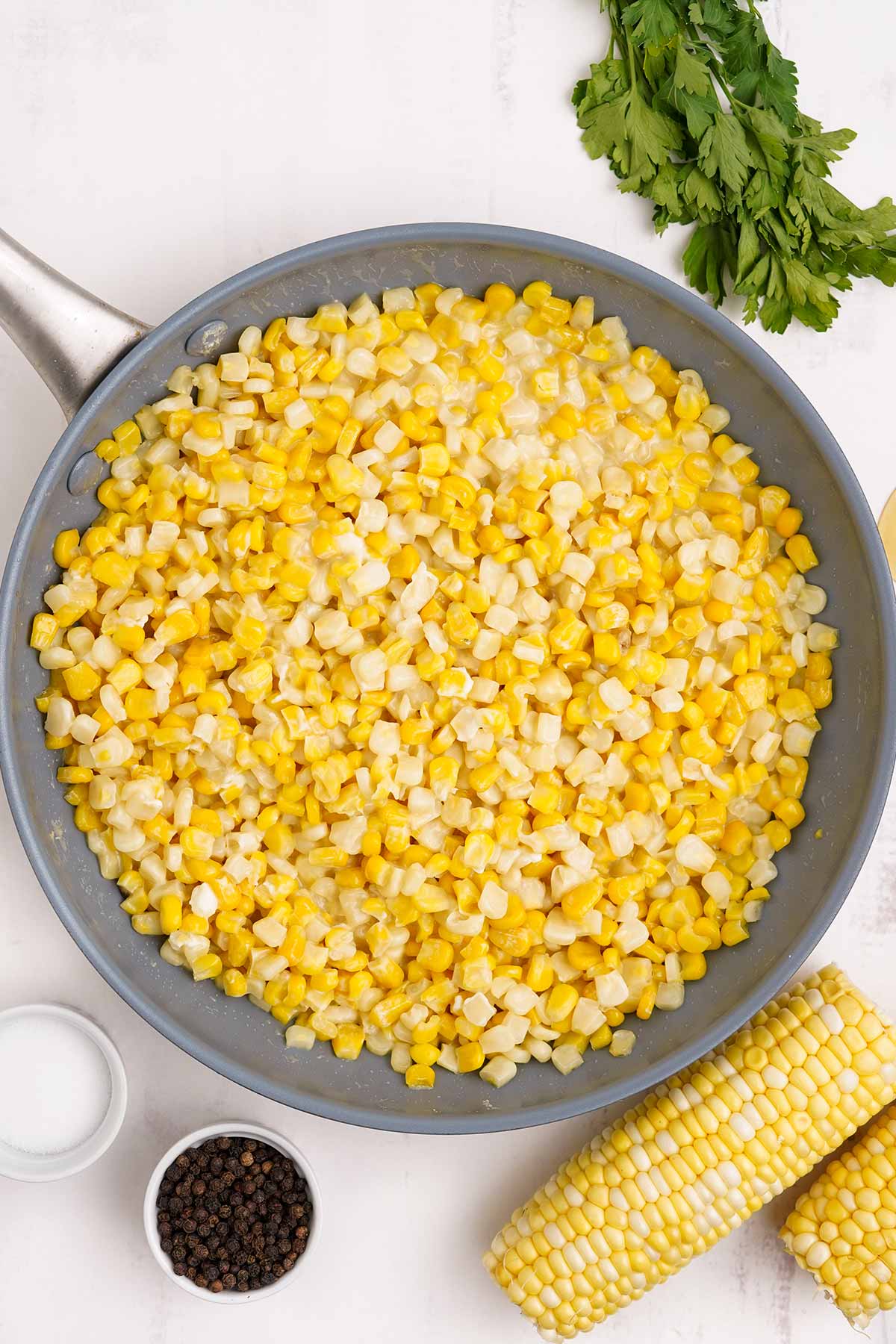 Honey butter skillet corn cooking in a pan.