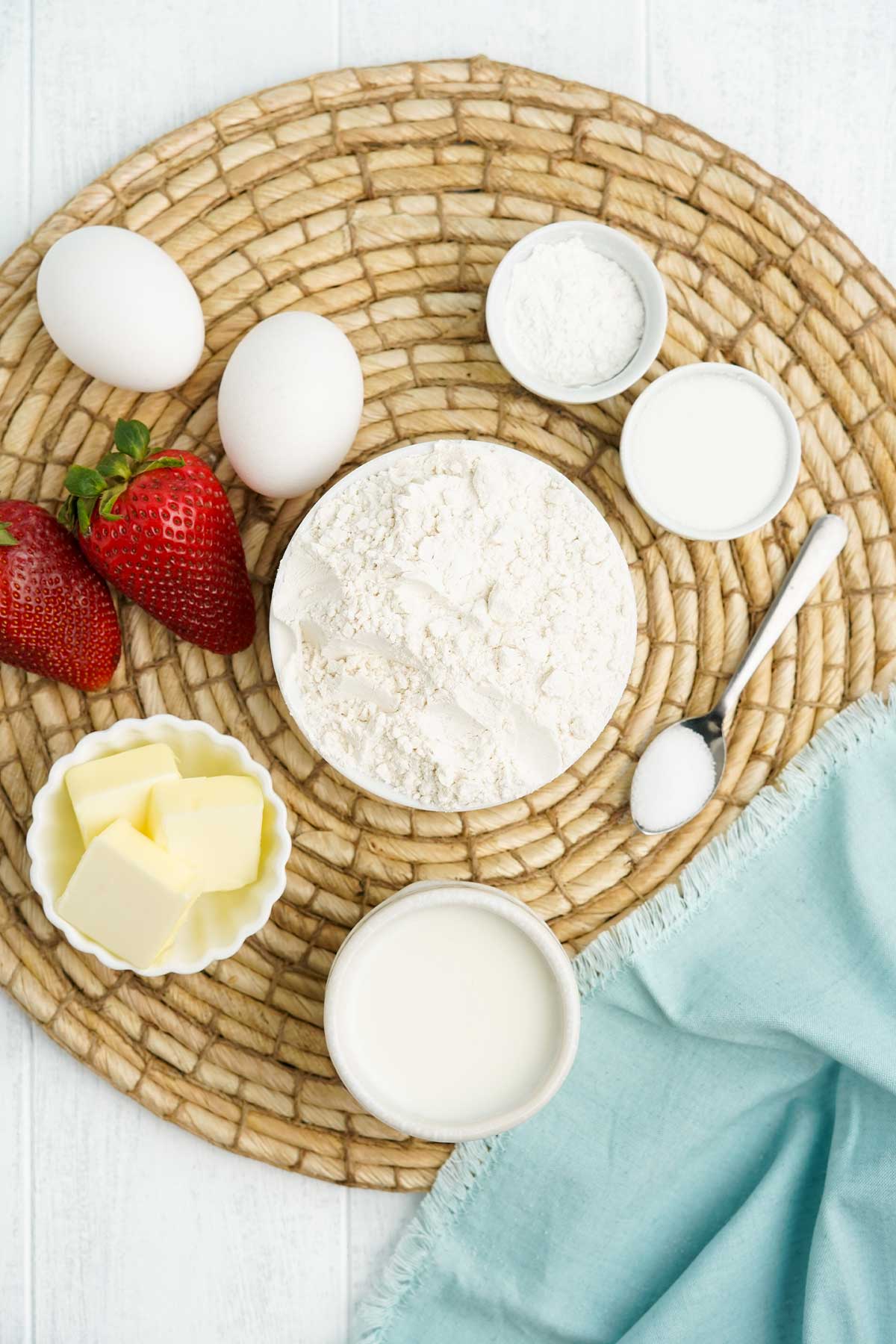 Ingredients to make oat milk pancakes on the table.