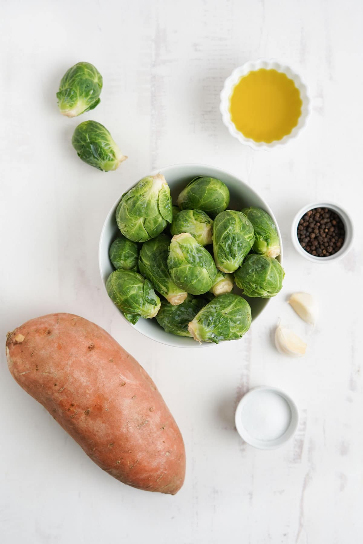 Ingredients to make brussel sprouts and sweet potatoes.