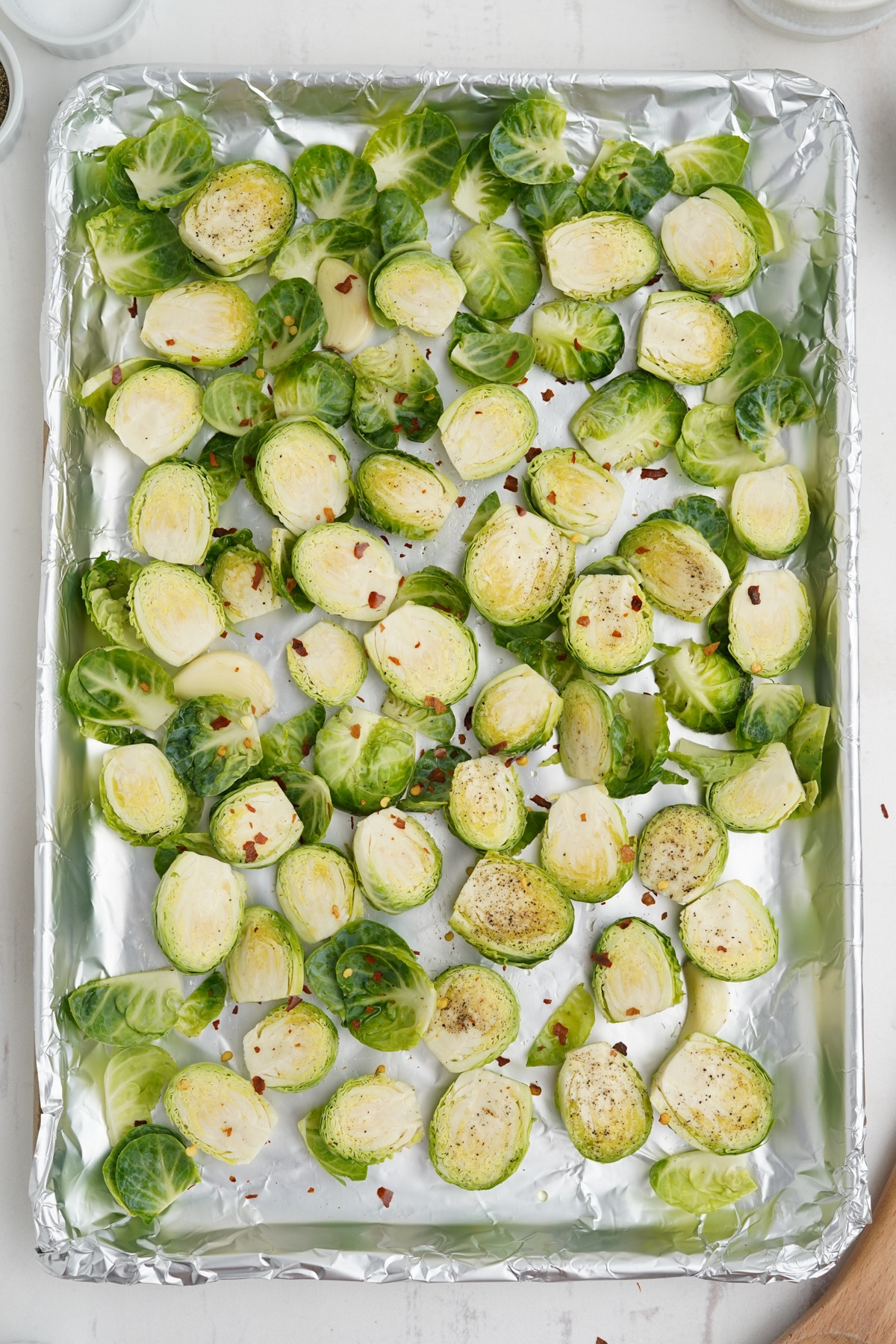 Brussels sprouts on a baking tray.