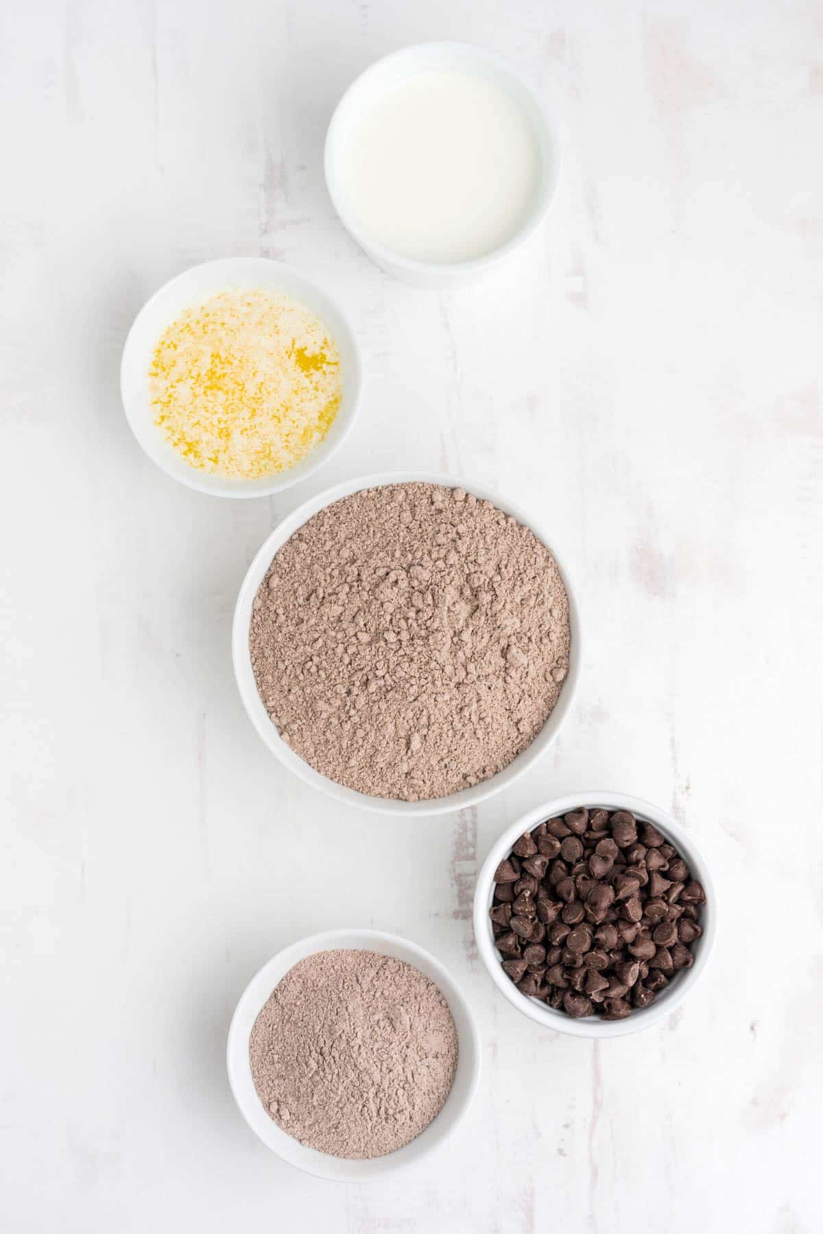 Ingredients to make chocolate dump cake on the table.