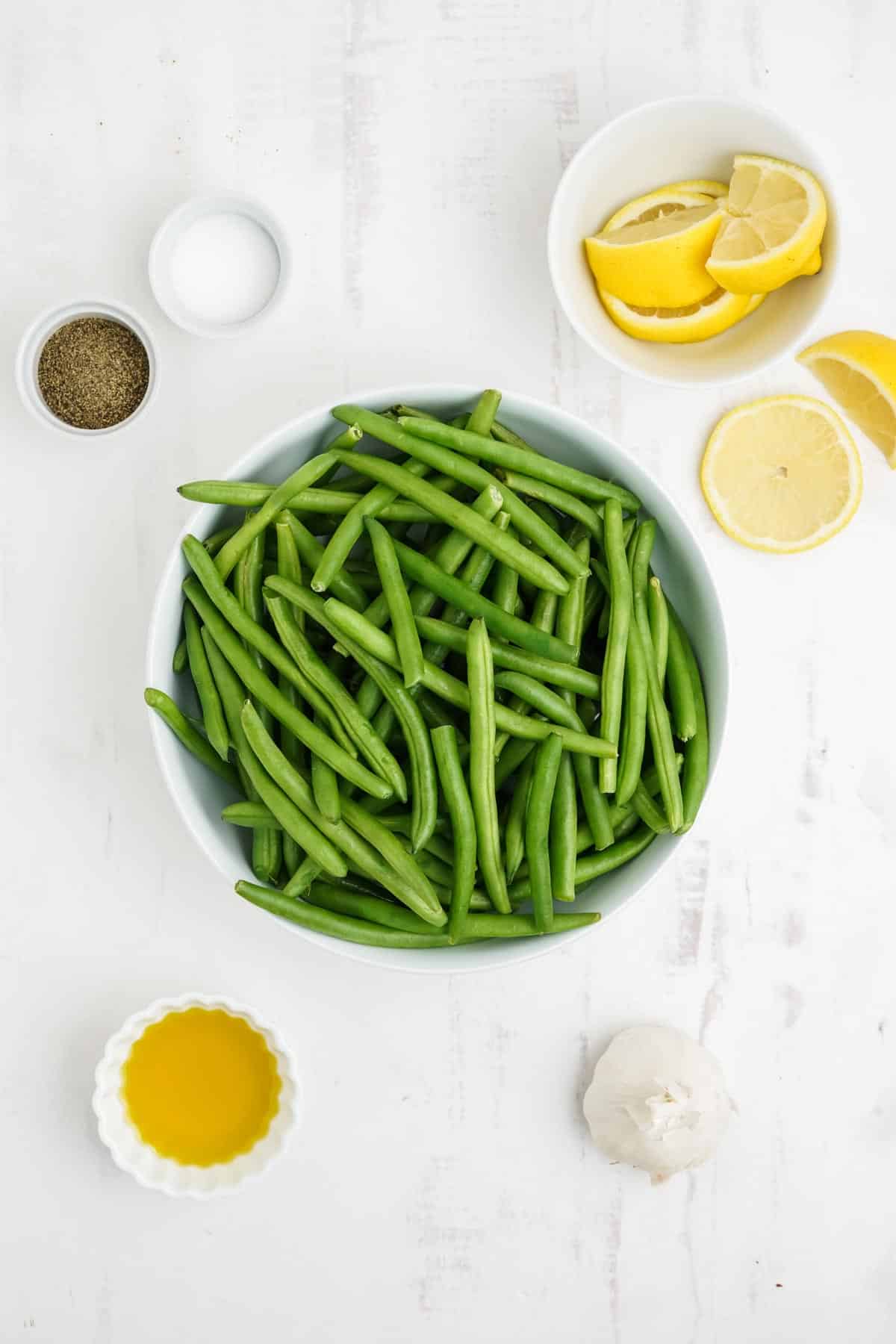 Ingredients to make oven green beans on the table.