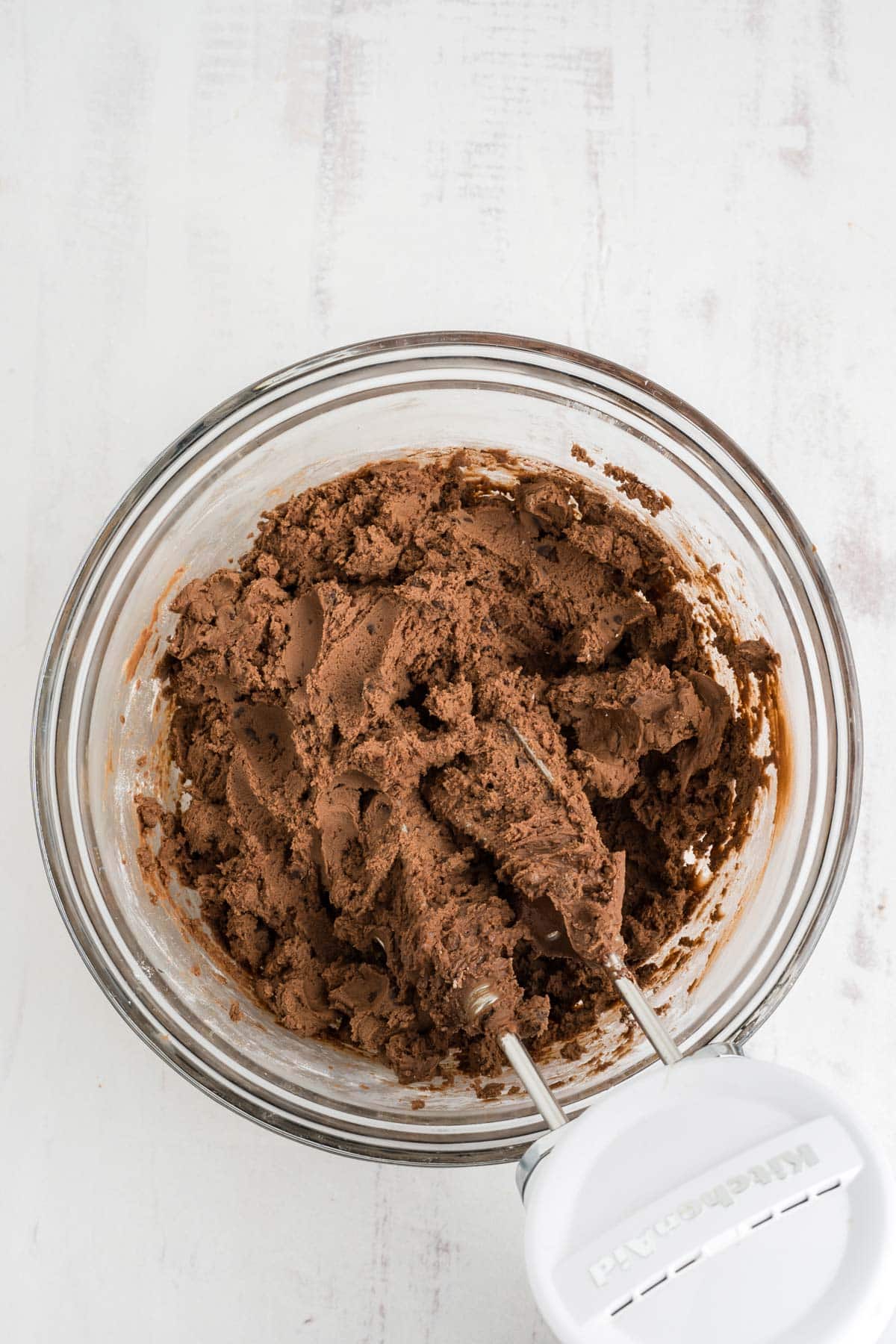 Beaten cookie batter after the flour is added to the bowl.