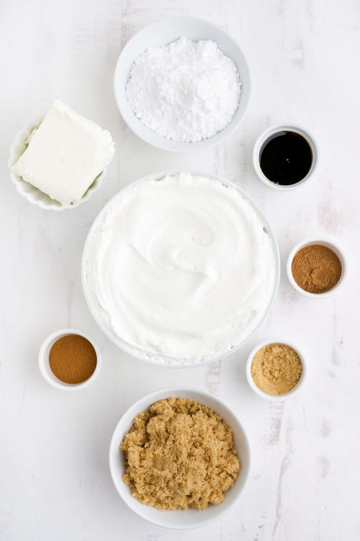 Ingredients to make gingerbread dip on the table before mixing together.