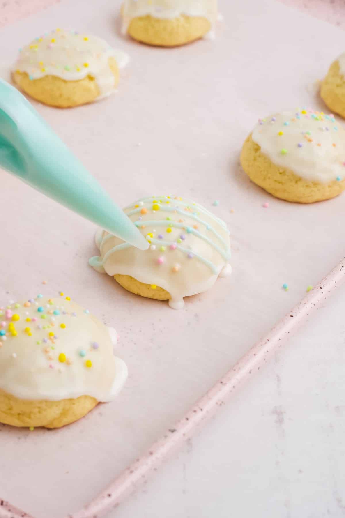 Decorating the cookies with icing.