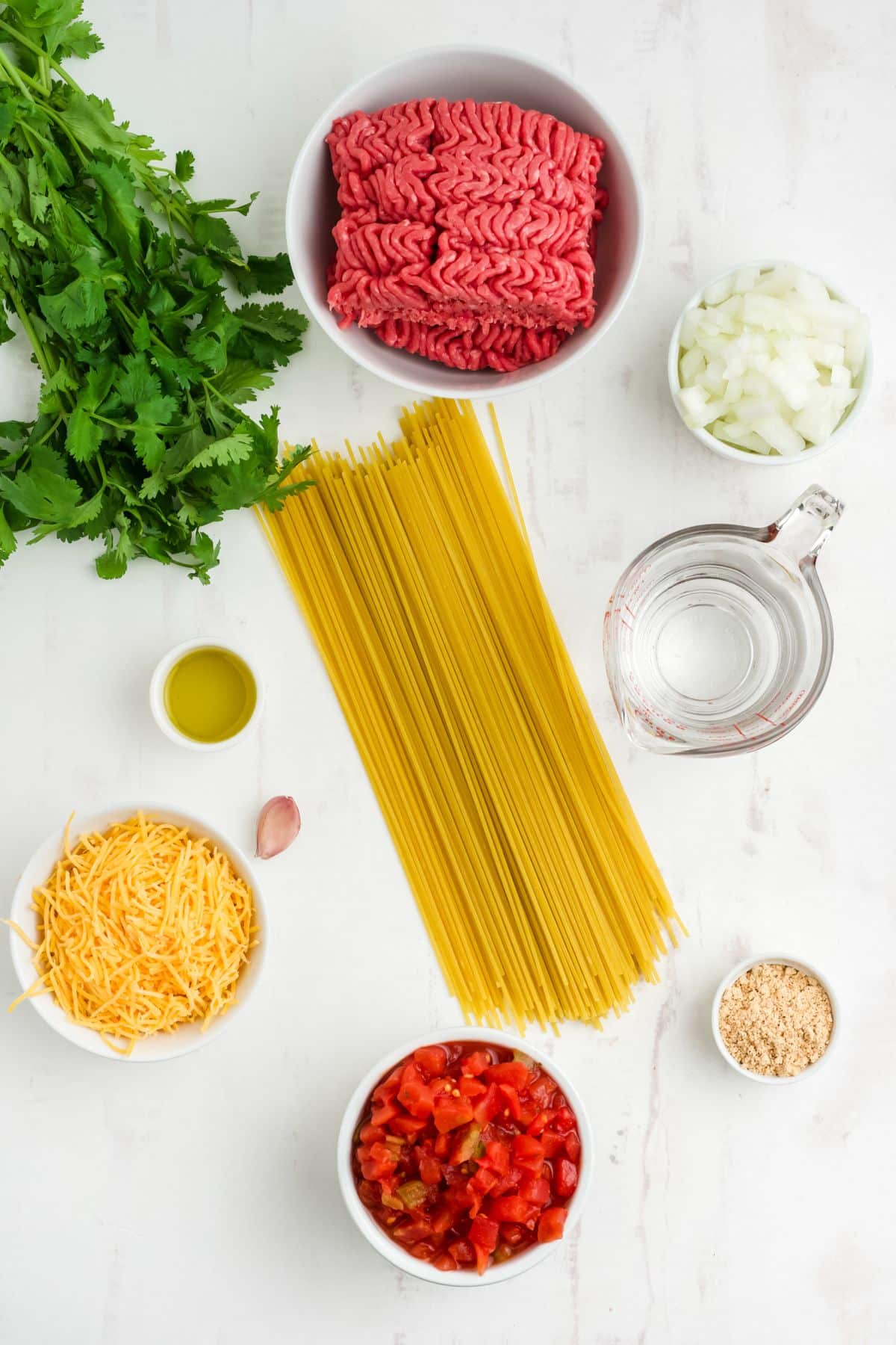 Ingredients to make taco spaghetti on the table before making.