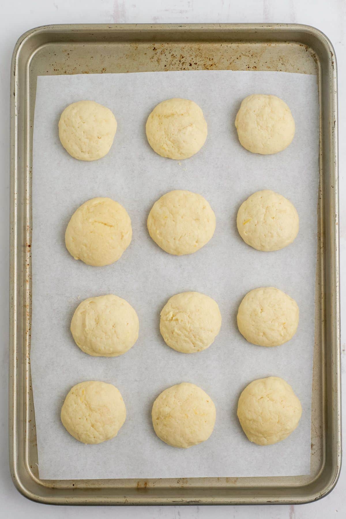 Baked cookies on the tray after coming out of the oven.