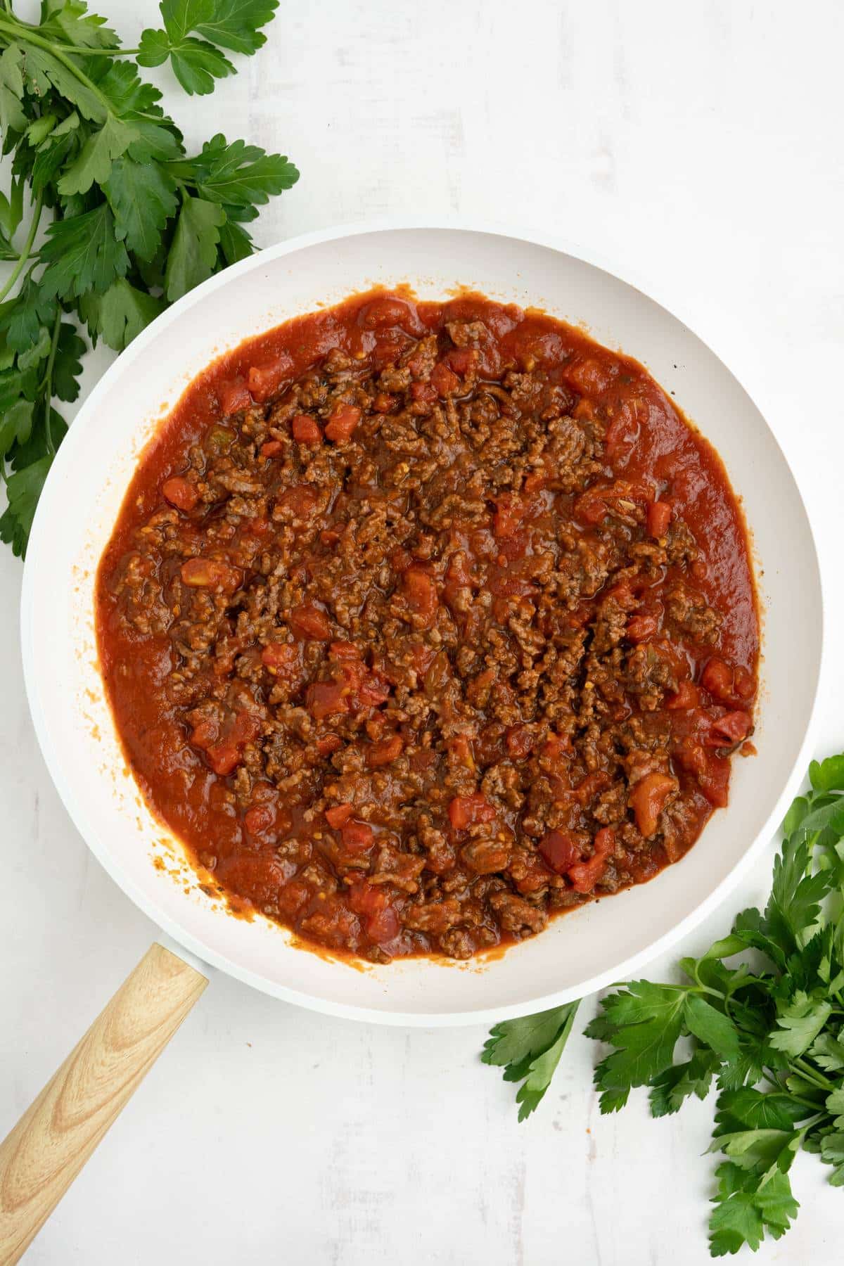 Ground beef cooked in pasta sauce.