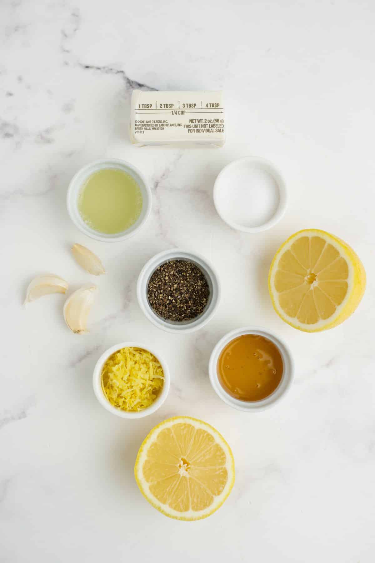 Ingredients to make lemon pepper sauce on the table before cooking.