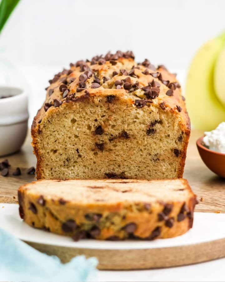 Cottage cheese banana bread with a slice cut to show inside.