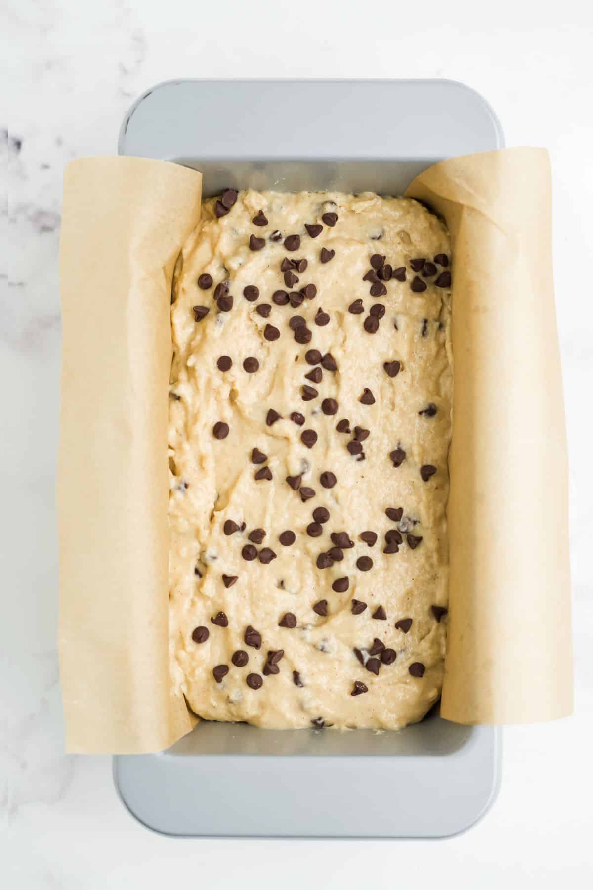 Batter poured into a parchment lined baking pan.