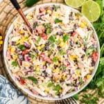 An overhead image of southwestern style coleslaw in a white bowl.