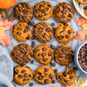 Overhead image of several pumpkin chocolate chip cookies on a platter.