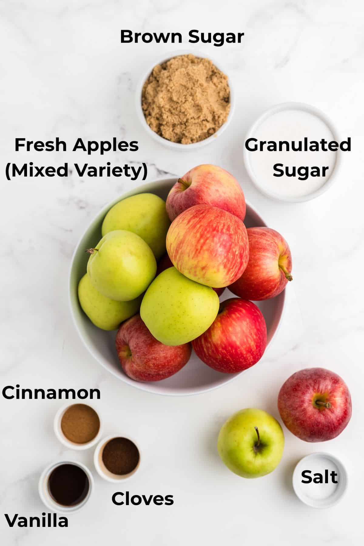 An overhead image of ingredients for ingredients needed to make slow cooker apple butter.