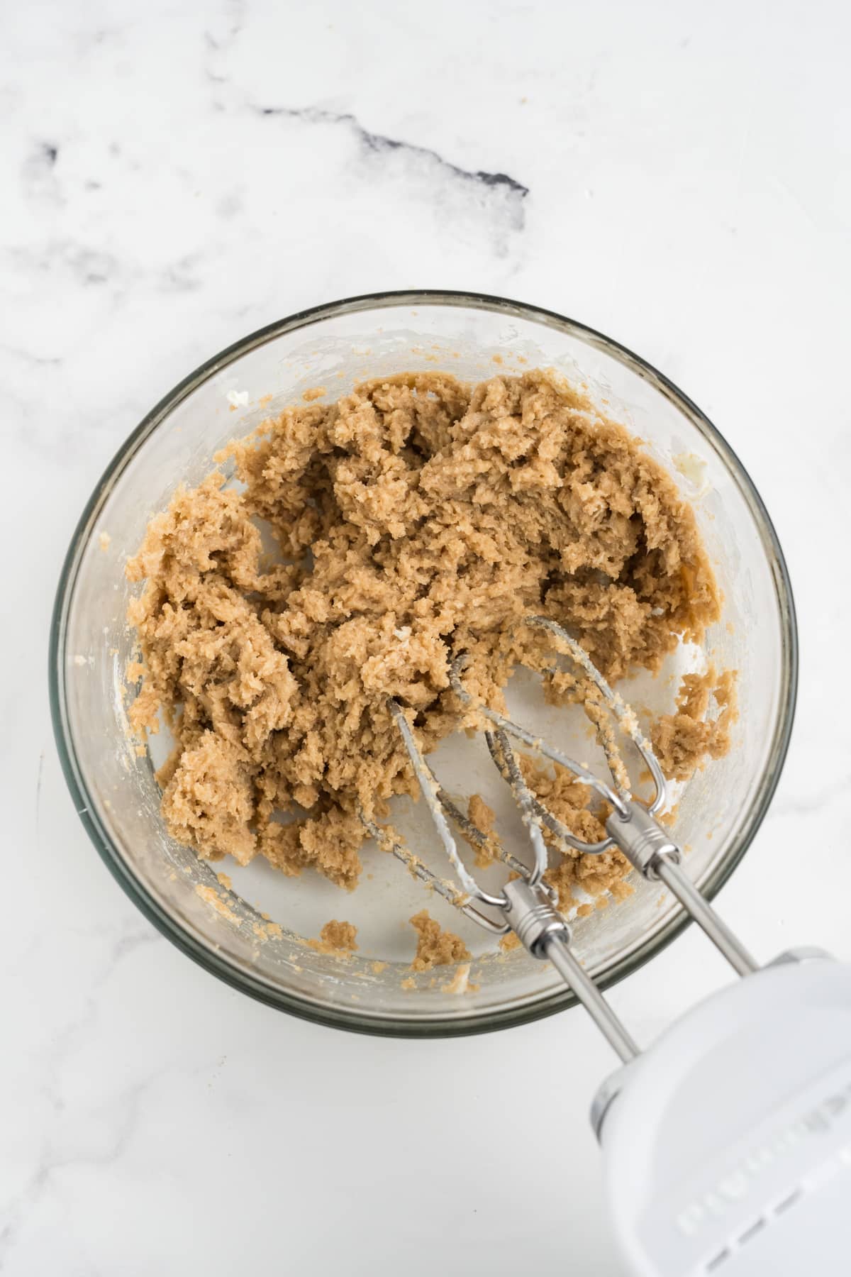 Butter and Sugar being creamed in a bowl. 