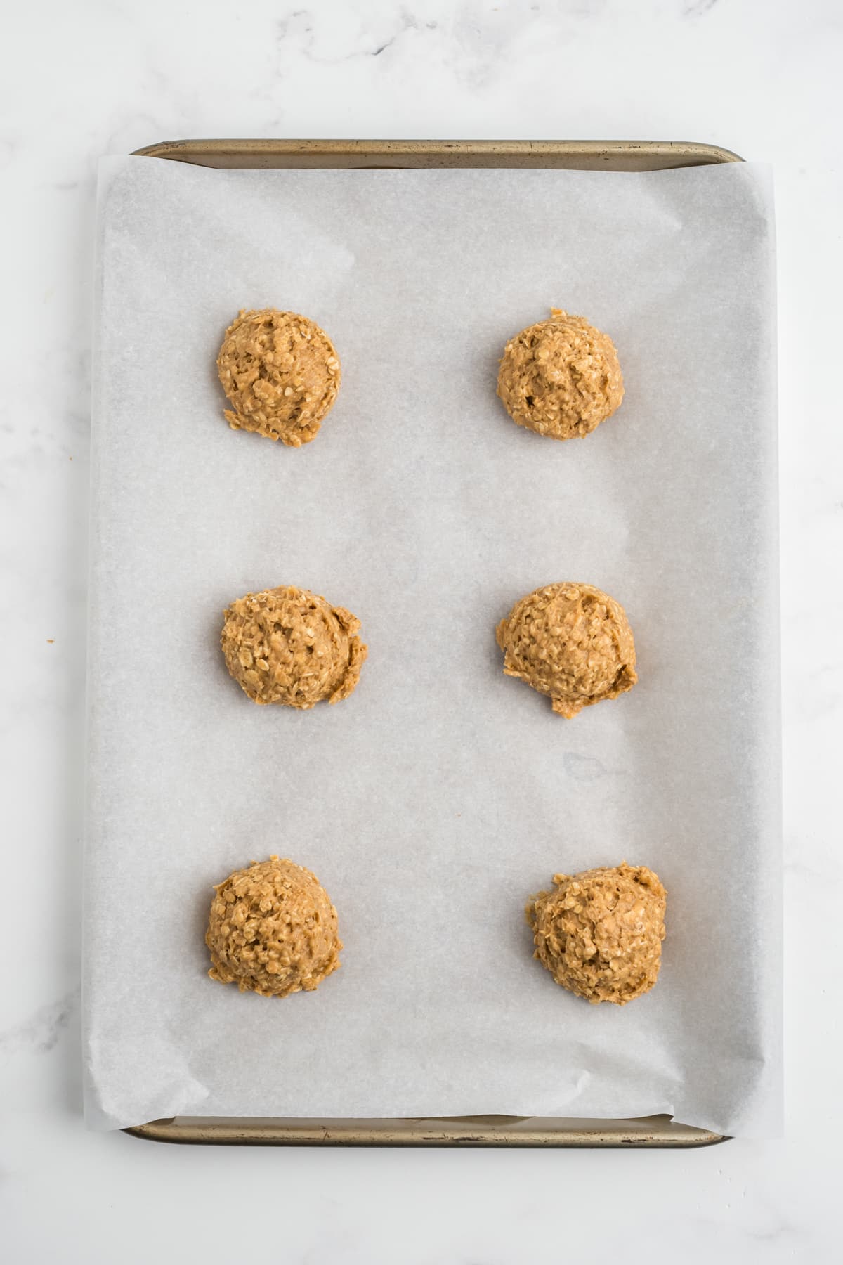 Cookie Dough on a baking sheet before baking. 
