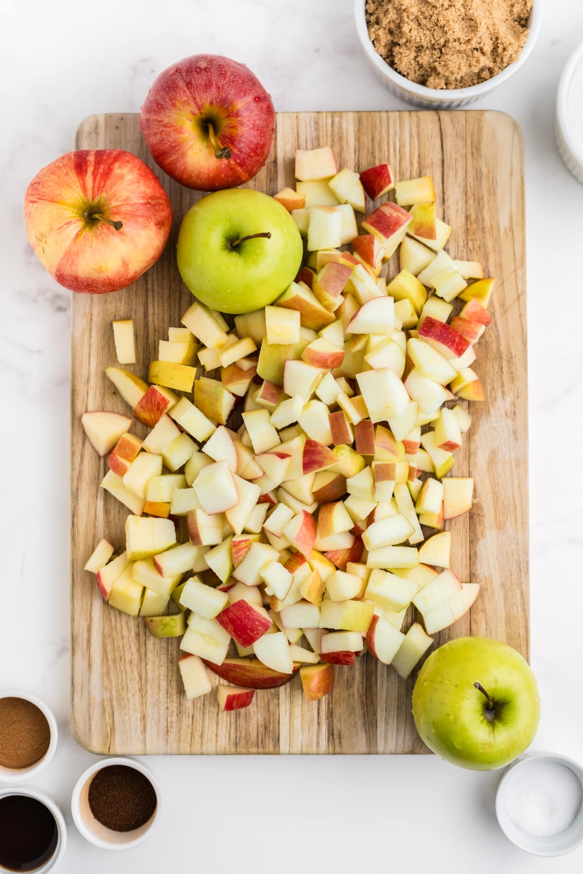 Apples being diced for crockpot apple butter.