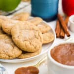 a close up image of apple butter cookies on a plate