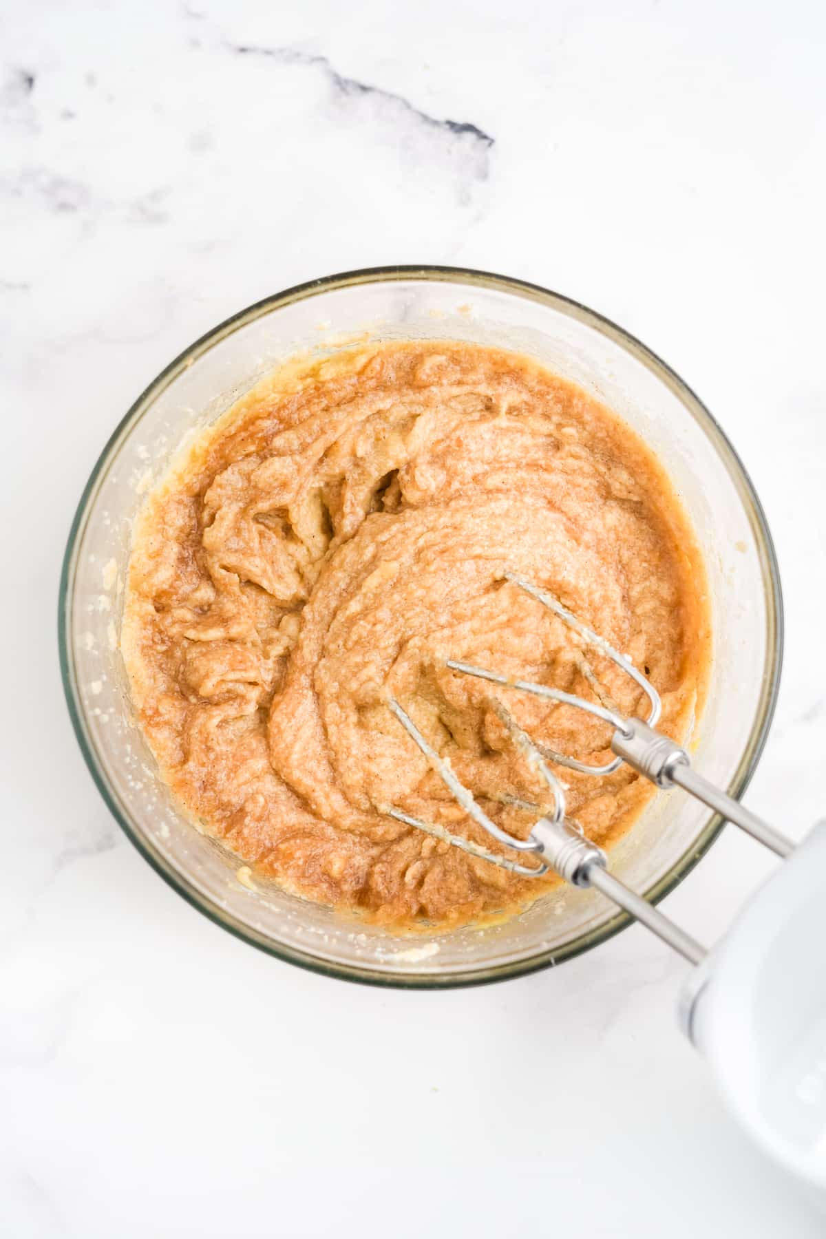 cookie dough being mixed in a bowl