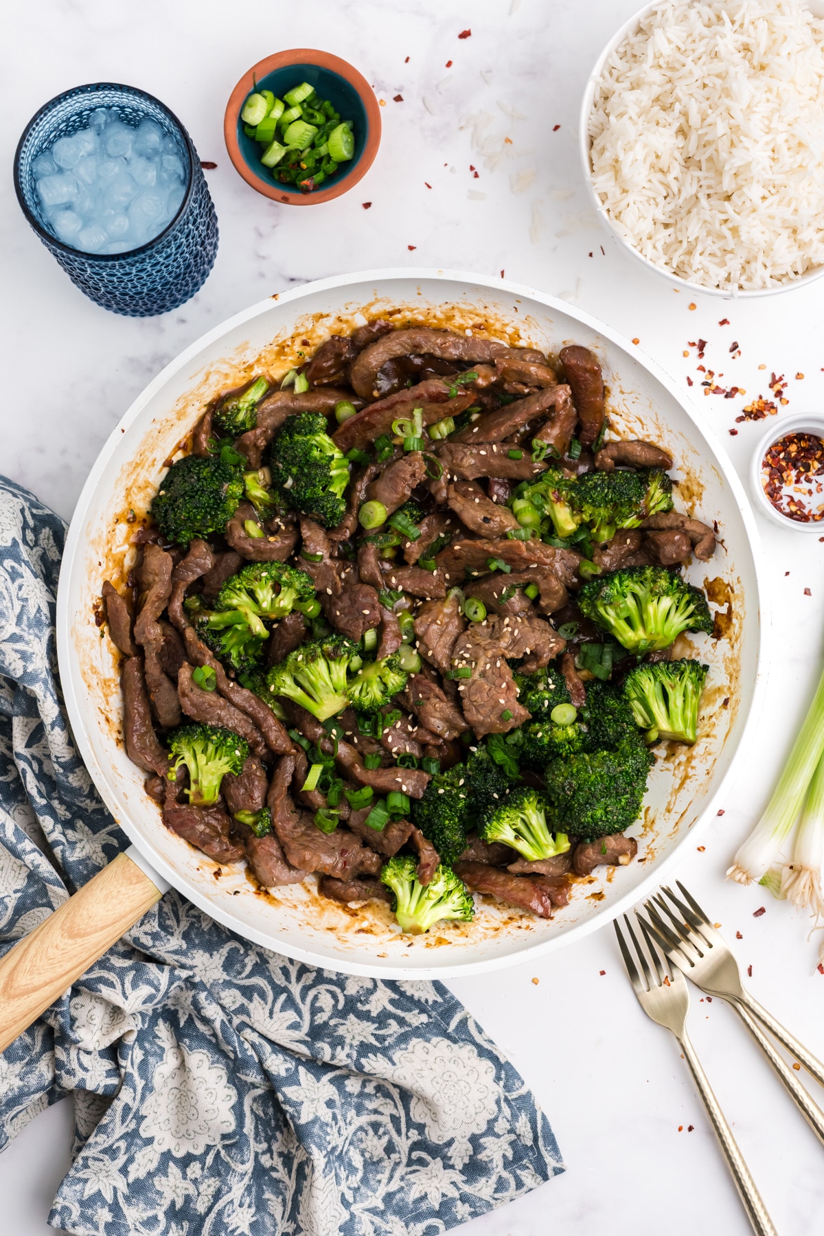 Cooked beef and broccoli in a skillet.