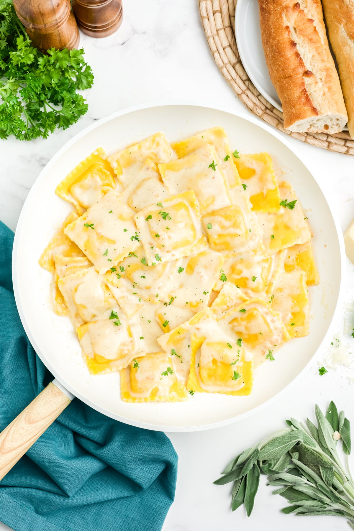 Butternut squash ravioli in a pan.