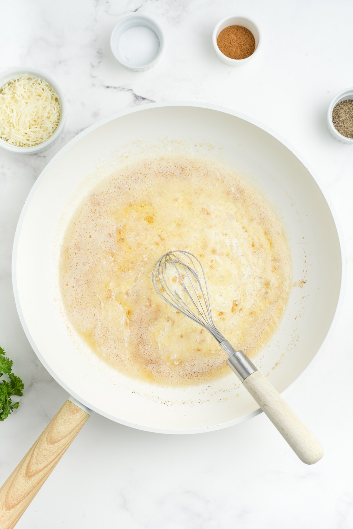 Butter mixture with cream, cheese and seasonings in the pan.