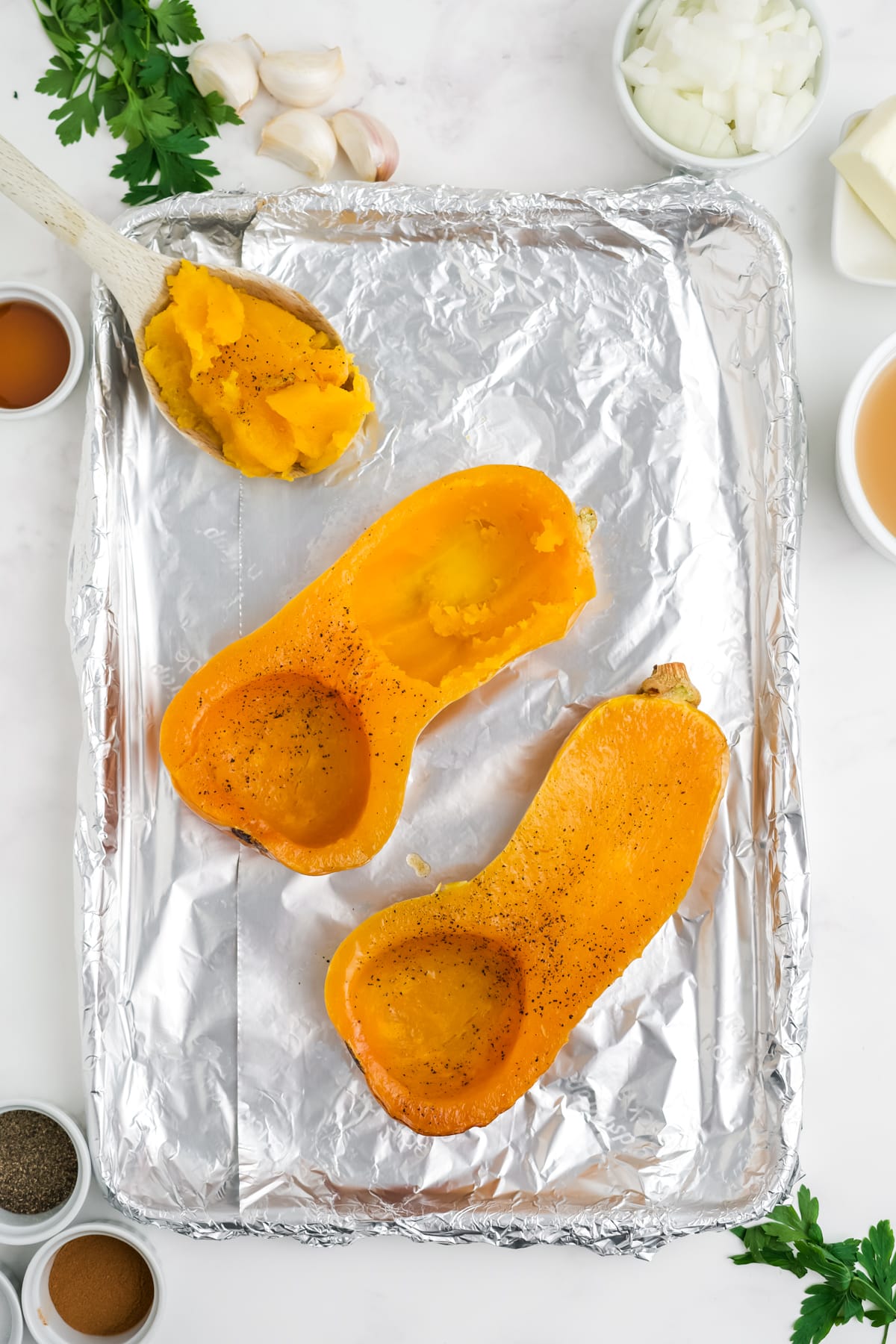 Roasted butternut squash cut in half.