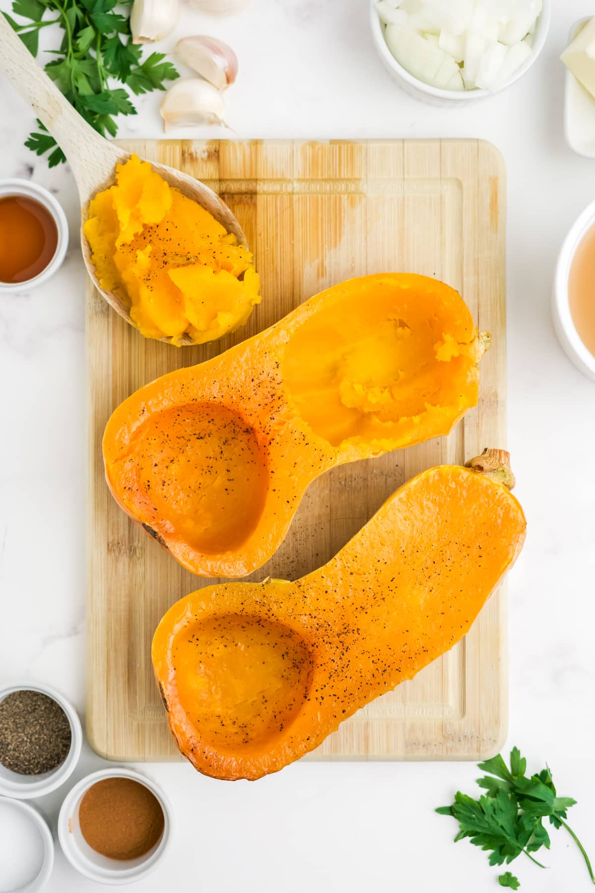 Roasted butternut squash with some scooped out. 