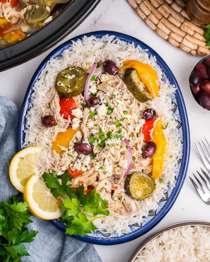 Overhead image of slow cooker greek chicken on a platter.