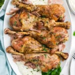 Slow cooker turkey legs on a serving dish.