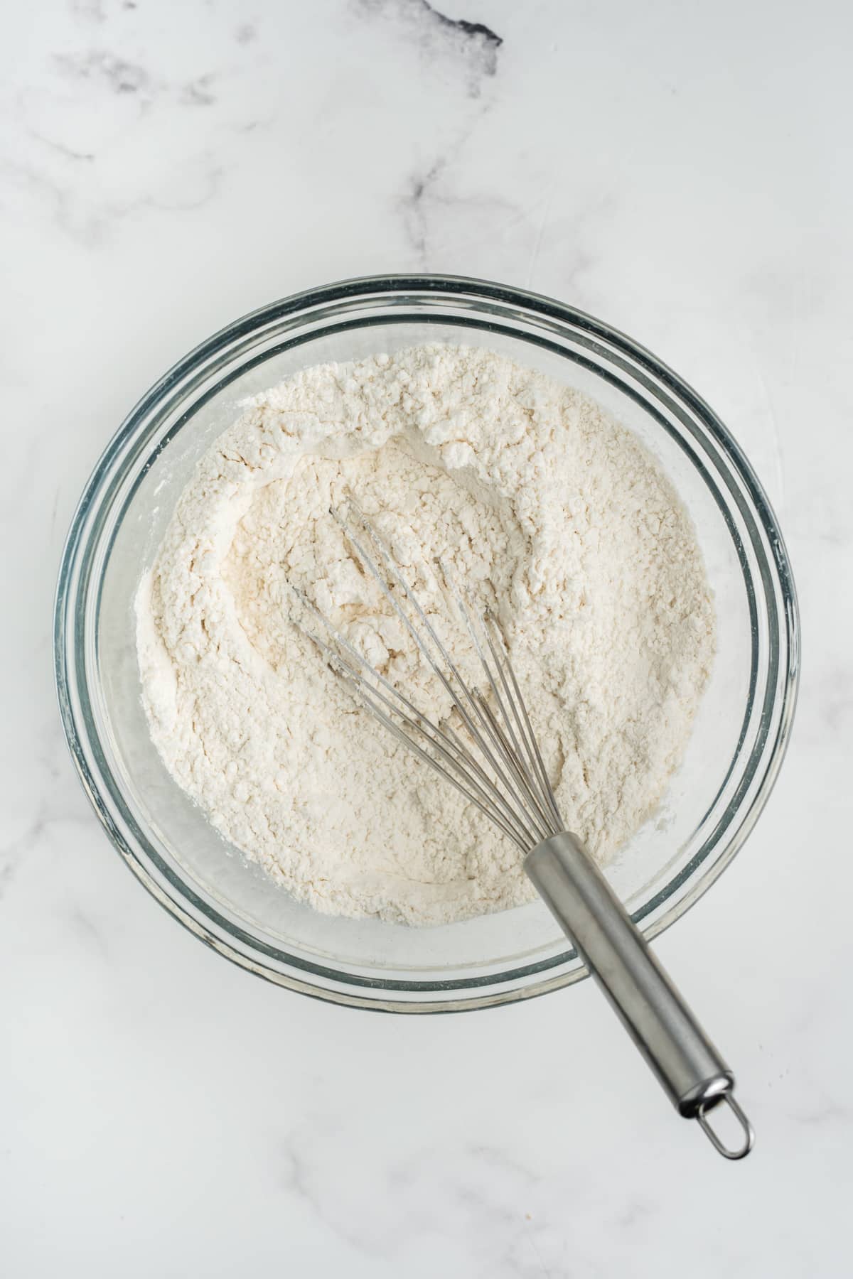 Dry ingredients for making these cookies mixed together in a bowl.