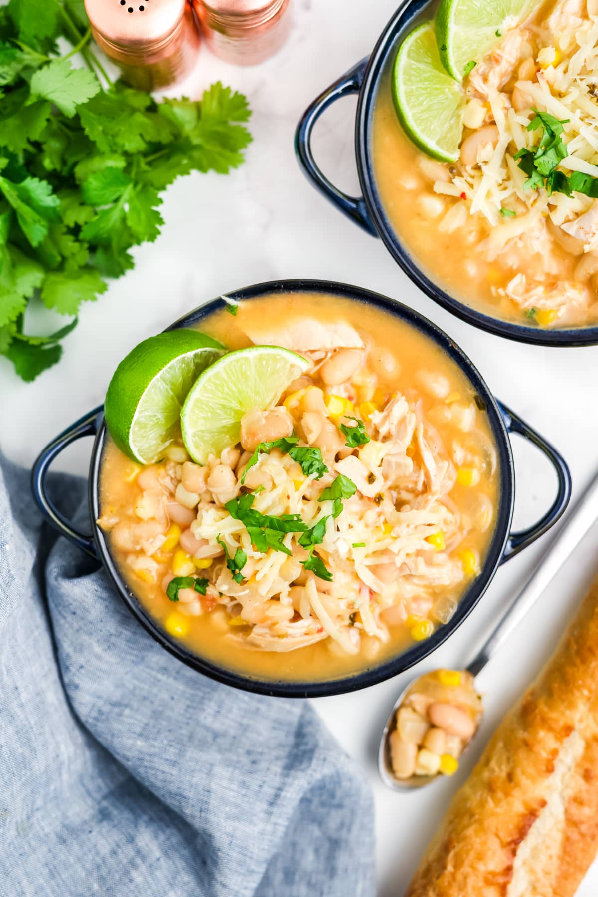White chicken chili with corn in a pot.