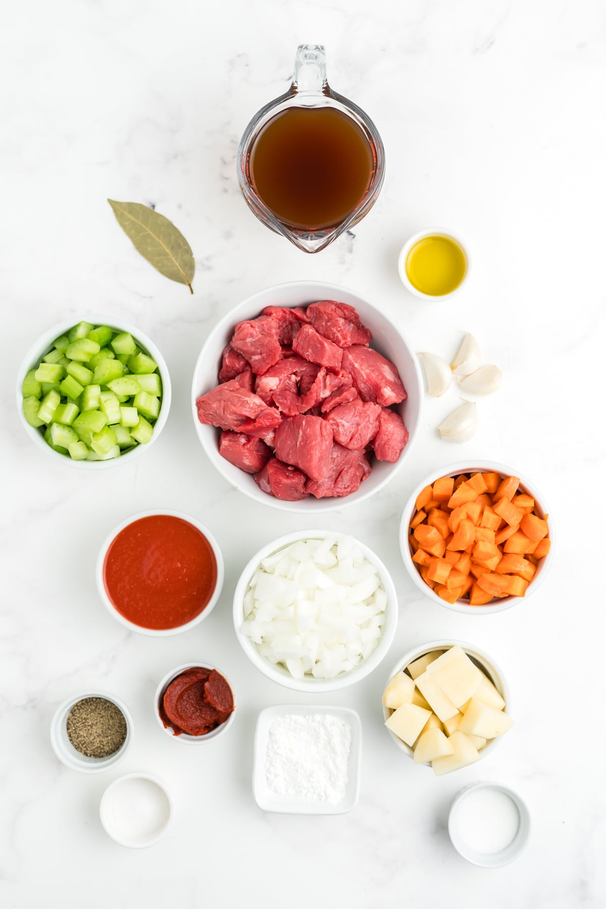 Ingredients for making Hawaiian beef stew in bowls.