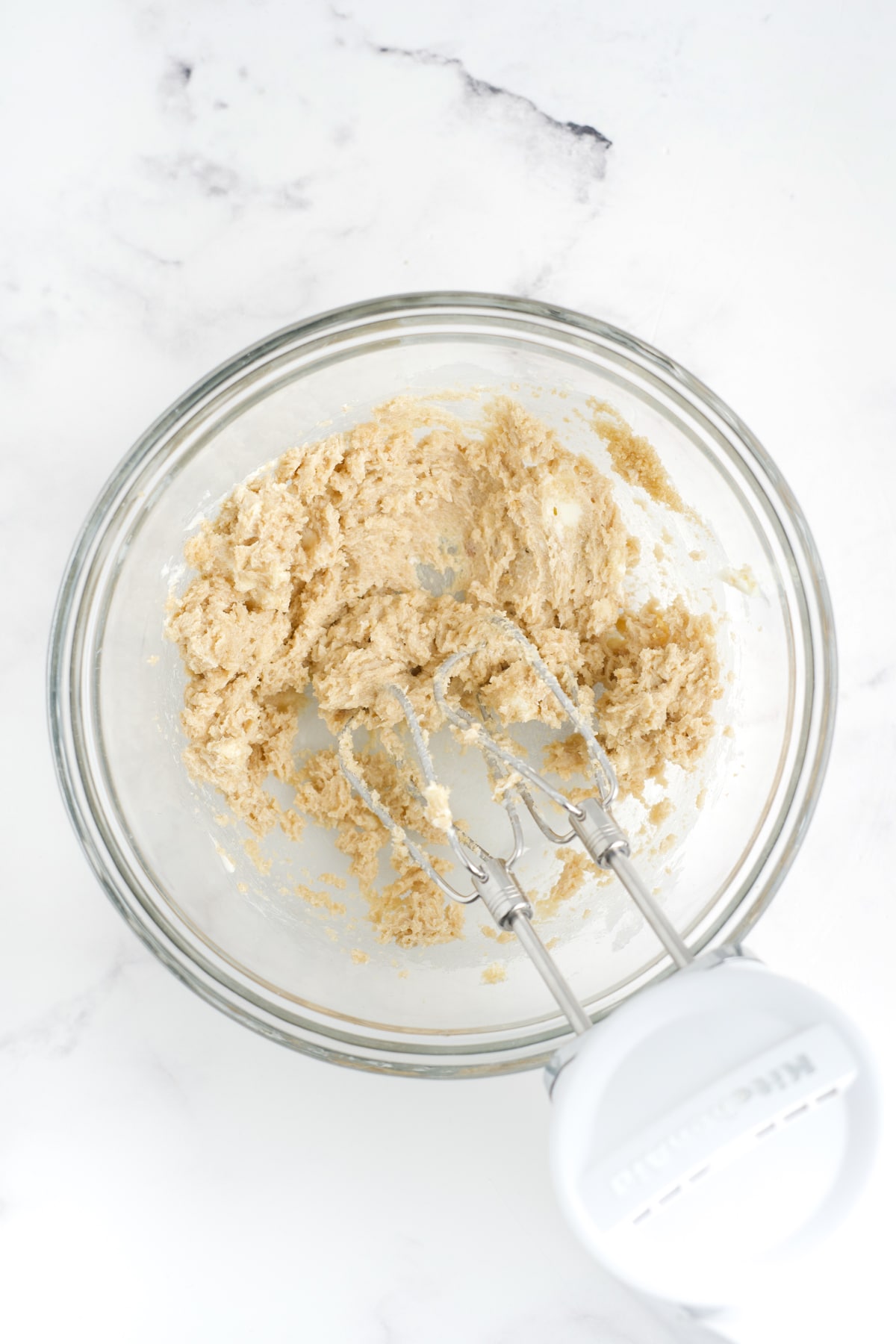 The butter and brown sugar mixed in a bowl.