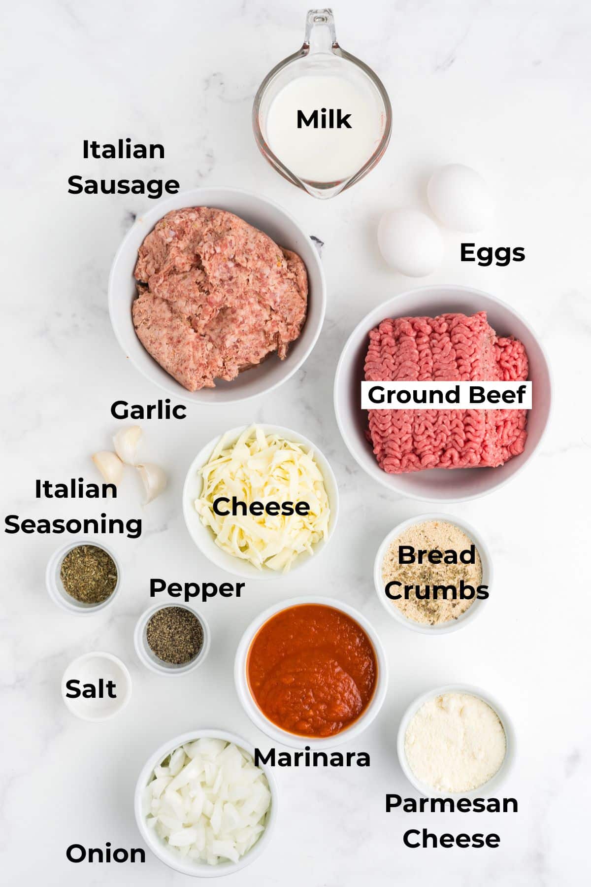 Ingredient to make this Italian-style meatloaf on a table.
