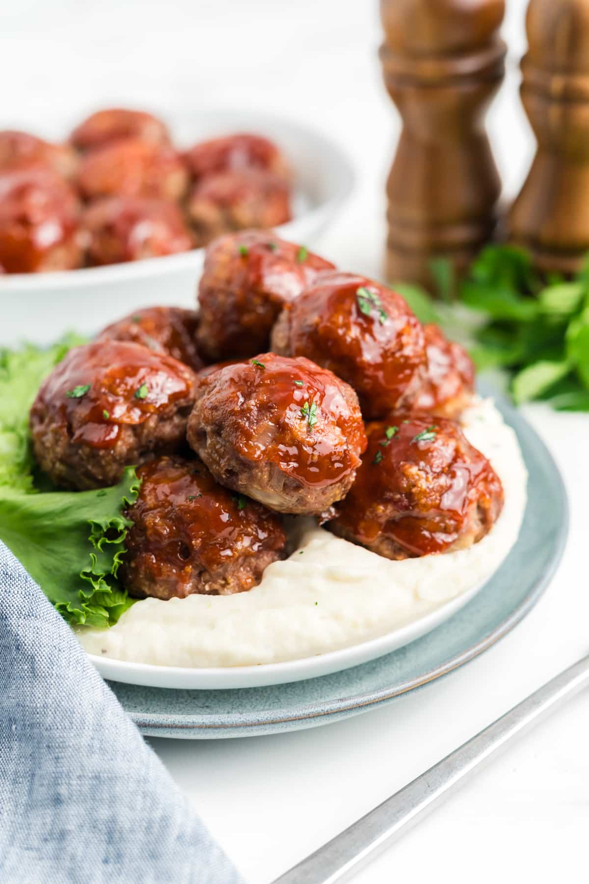 Meatloaf meatballs over mashed potatoes.