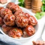 A plate filled with meatloaf meatballs.