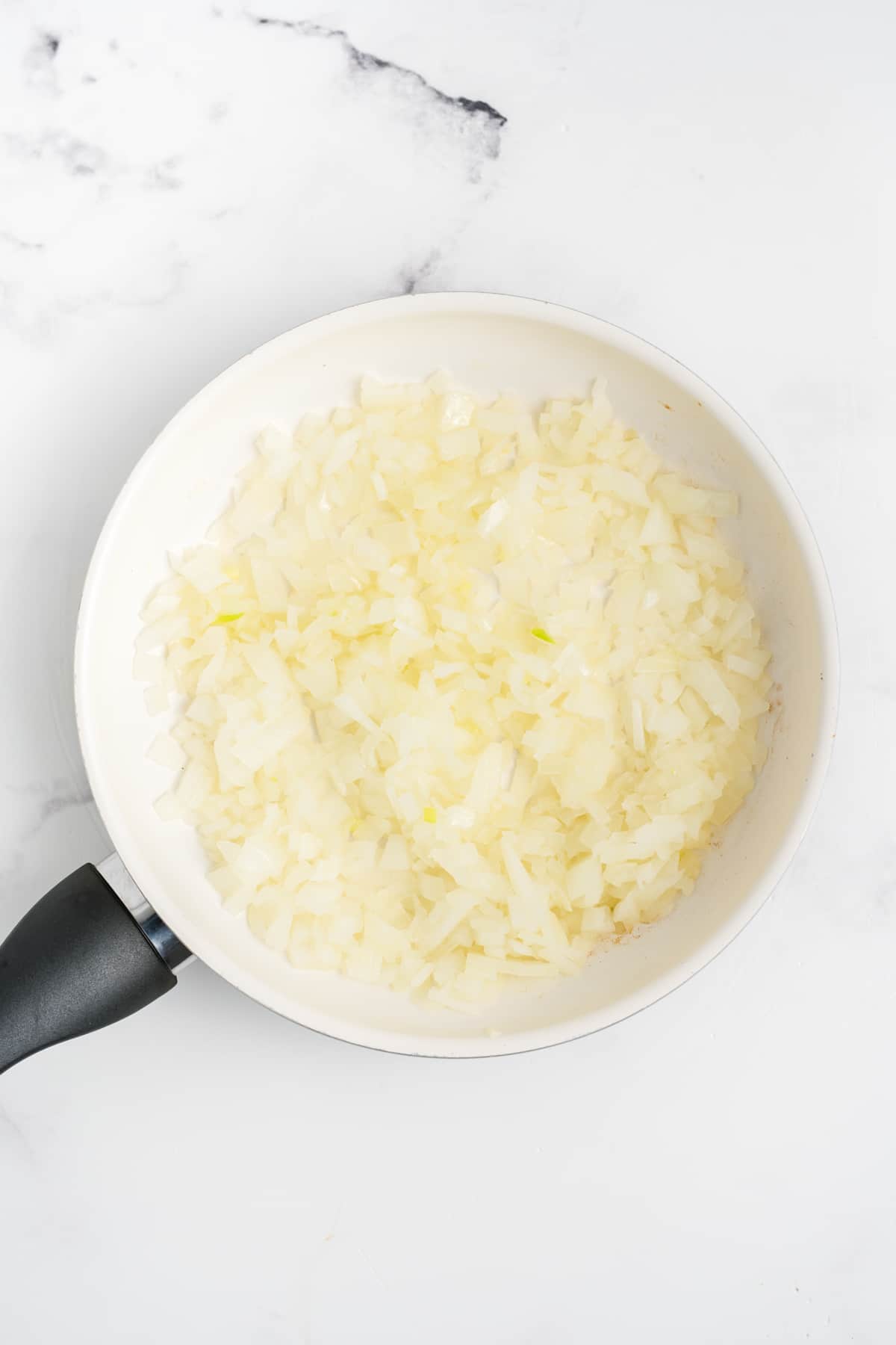 Onion and garlic in a pan.