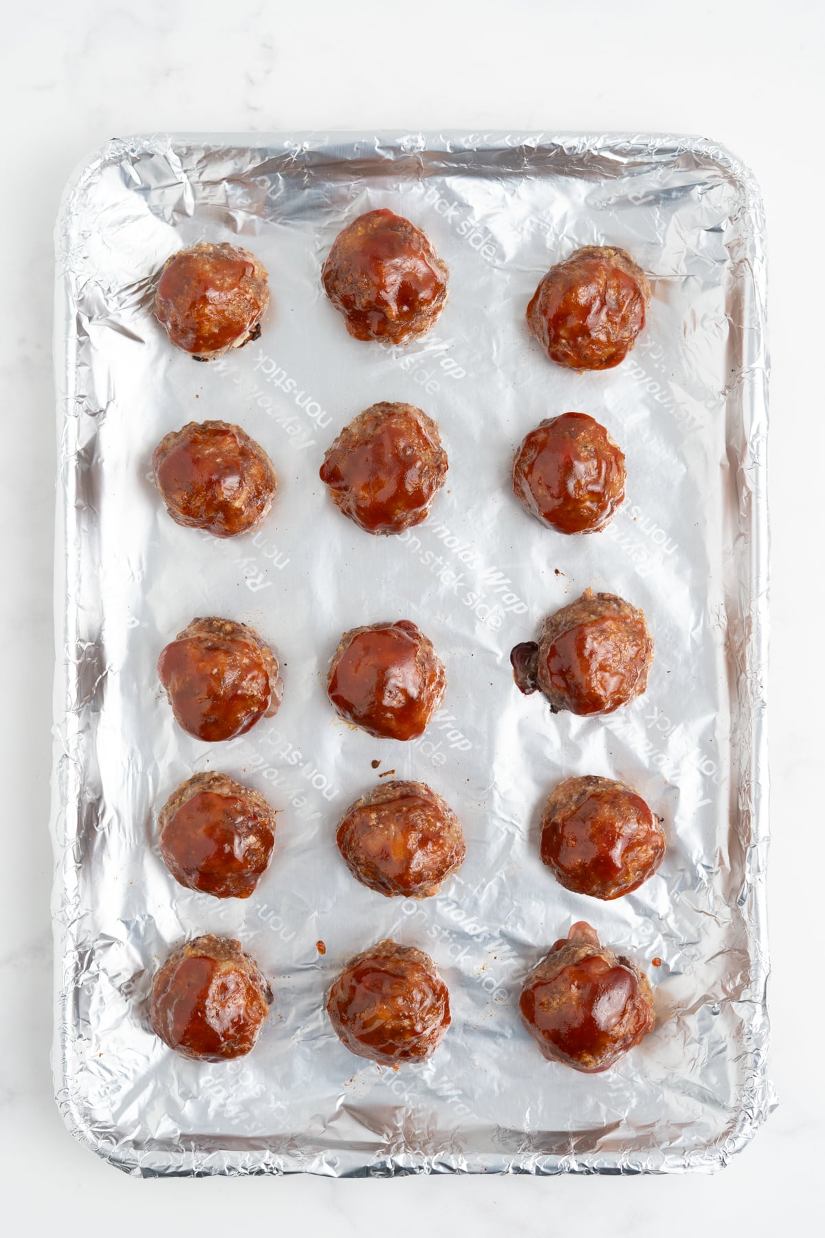 The meatballs resting after baking.