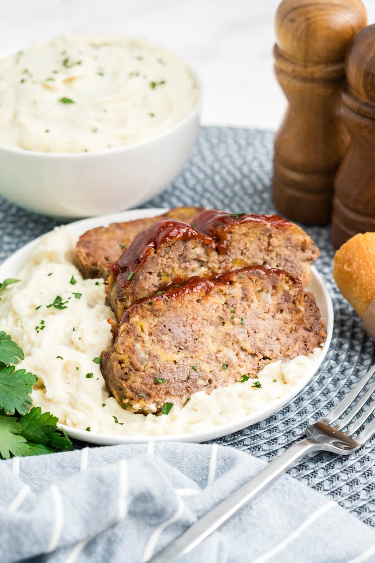 Meatloaf on a plate sliced up.